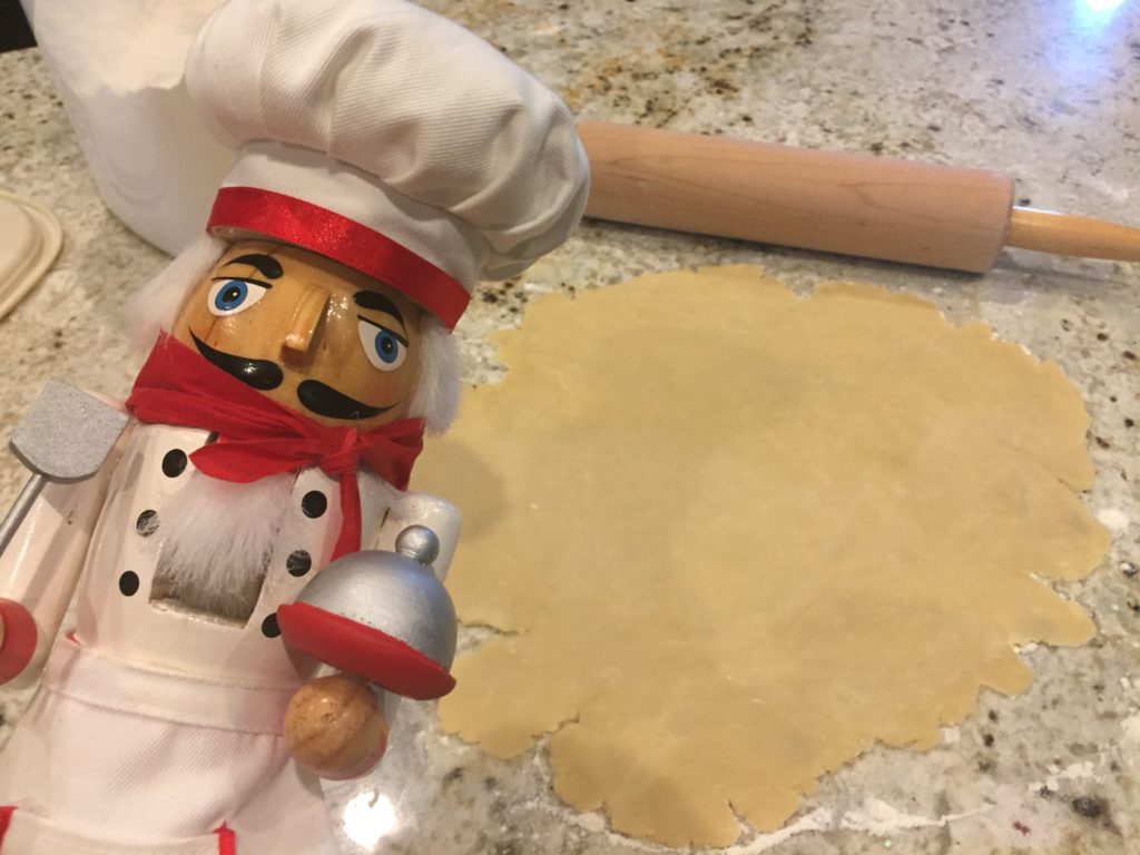 Pepe rolling out the pastry dough