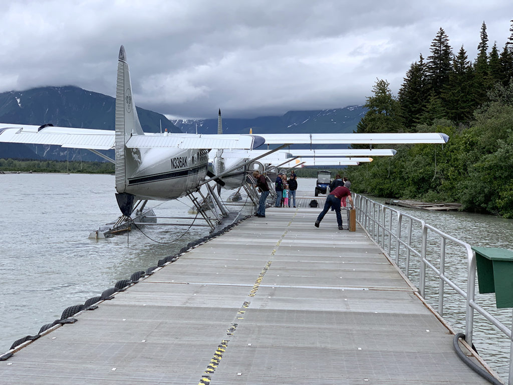 See planes docked at Taku Lodge in Juneau, Alaska