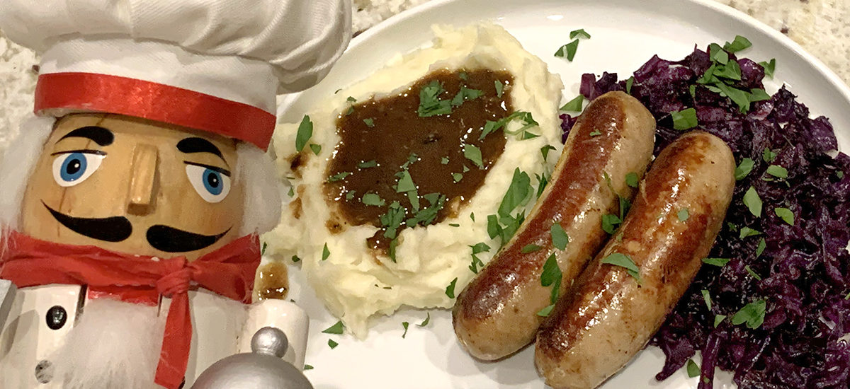 Bangers & Mash with Onion Gravy and Fried Cabbage