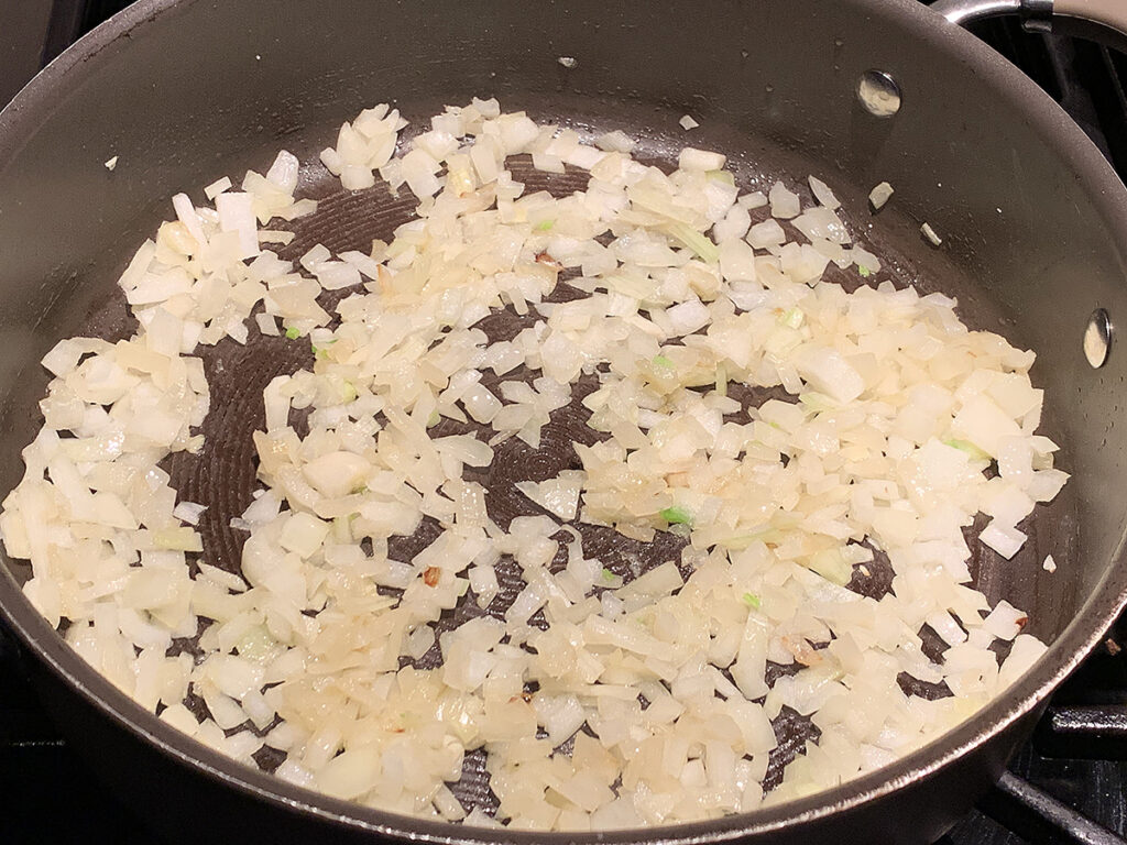 Chopped onions in a large skillet.