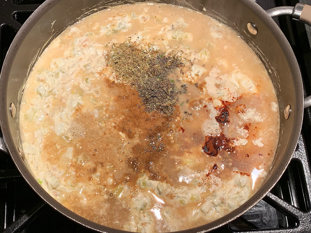 Seasonings added to the white sauce. 