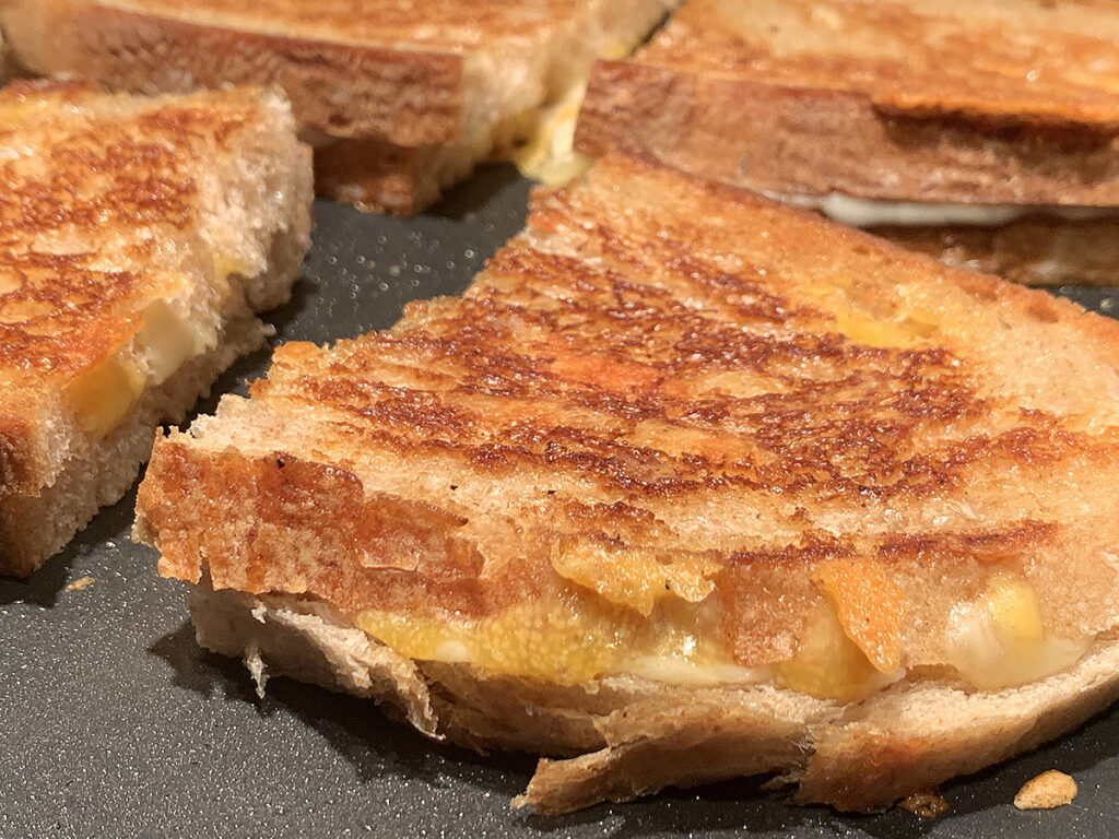 Gourmet grilled cheese on homemade sourdough bread and several cheeses. 